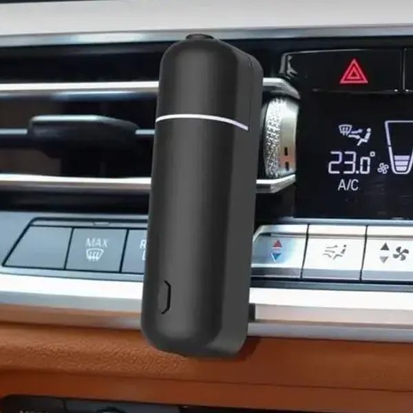 Автомобільний акумуляторний аромадифузор Ultrasonic Car Aroma Diffuser та 6 ароматів чорний 1801415 фото