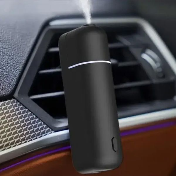 Автомобільний акумуляторний аромадифузор Ultrasonic Car Aroma Diffuser та 6 ароматів чорний 1801415 фото