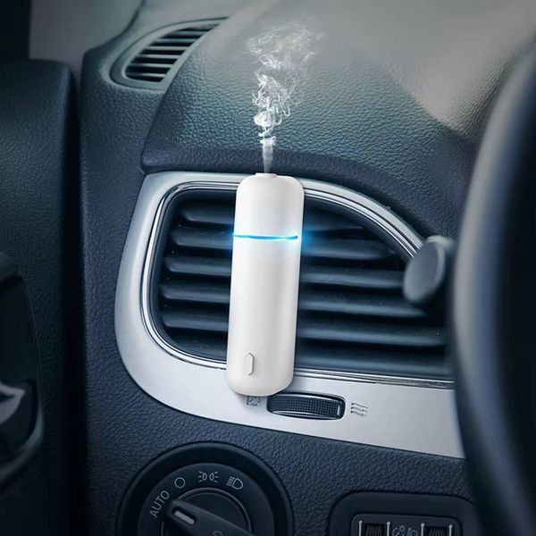 Автомобільний акумуляторний аромадифузор Ultrasonic Car Aroma Diffuser та 6 ароматів 1801306 фото